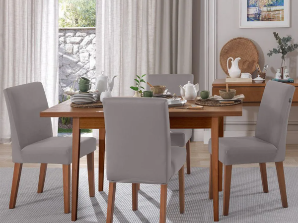 Como combinar capas de cadeira com a decoração da sala de jantar?